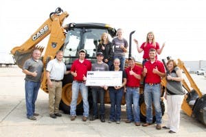 Students And Staff Of Southeastern Community College Surround The New Case Backhoe 300x200