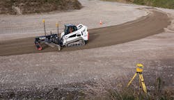 A compact track loader uses a machine control system to cut grade. A compact track loader uses a machine control system to cut grade.