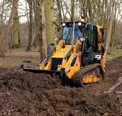 A JCB 1CXT pushes dirt A JCB 1CXT pushes dirt