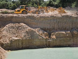 A K-Tec 1237 ADT working at a sand quarry
