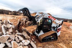 A Bobcat T76 outfitted with an industrial grapple A Bobcat T76 outfitted with an industrial grapple