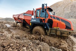 A Doosan DA30 works its way through muddy conditions. A Doosan DA30 works its way through muddy conditions.