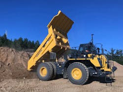 Komatsu’s HD405 unloads. Komatsu’s HD405 unloads.