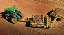 A John Deere scraper system featuring a 9570RT track tractor and 2112D scraper A John Deere scraper system featuring a 9570RT track tractor and 2112D scraper