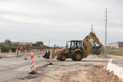 A Caterpillar 440 backhoe loader provides some muscle on the job site. A Caterpillar 440 backhoe loader provides some muscle on the job site.